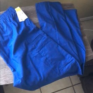 Pretty!! royal blue scrub pants. NWT. Size 1X